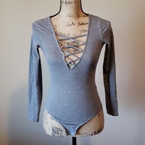 Divided long sleeved bodysuit